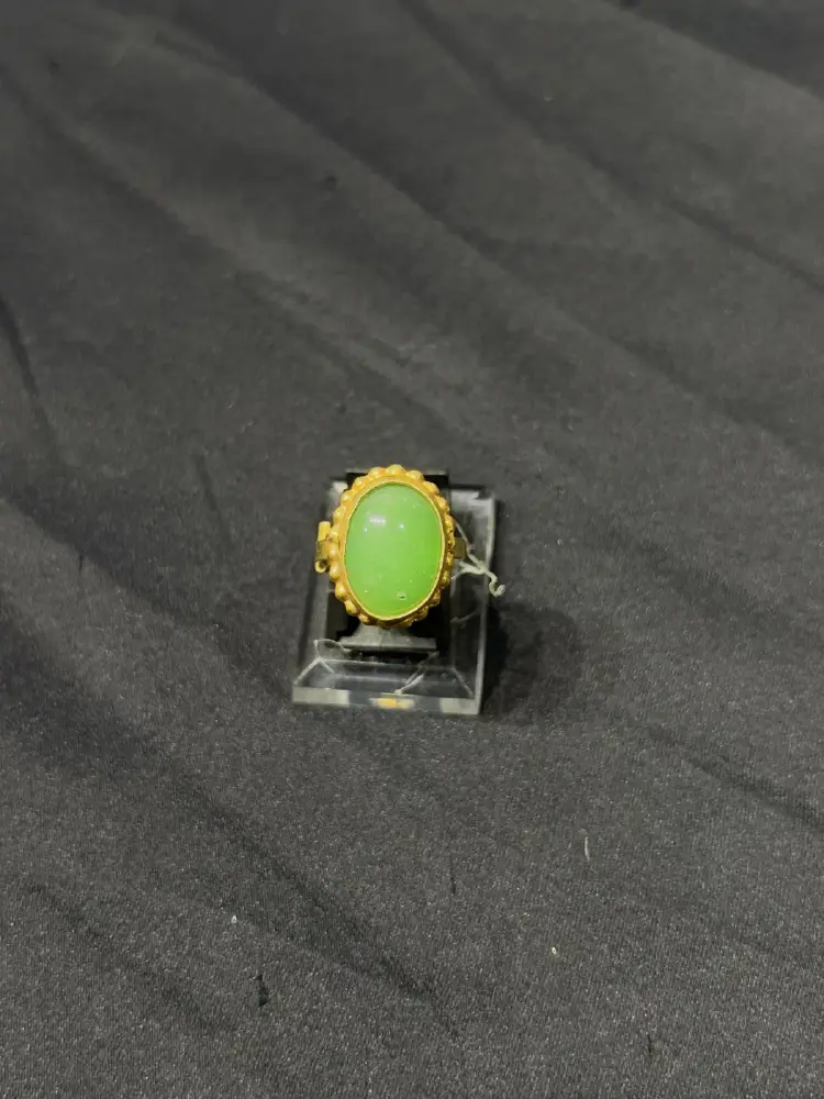 Goldplated adjustable Ring with green stone