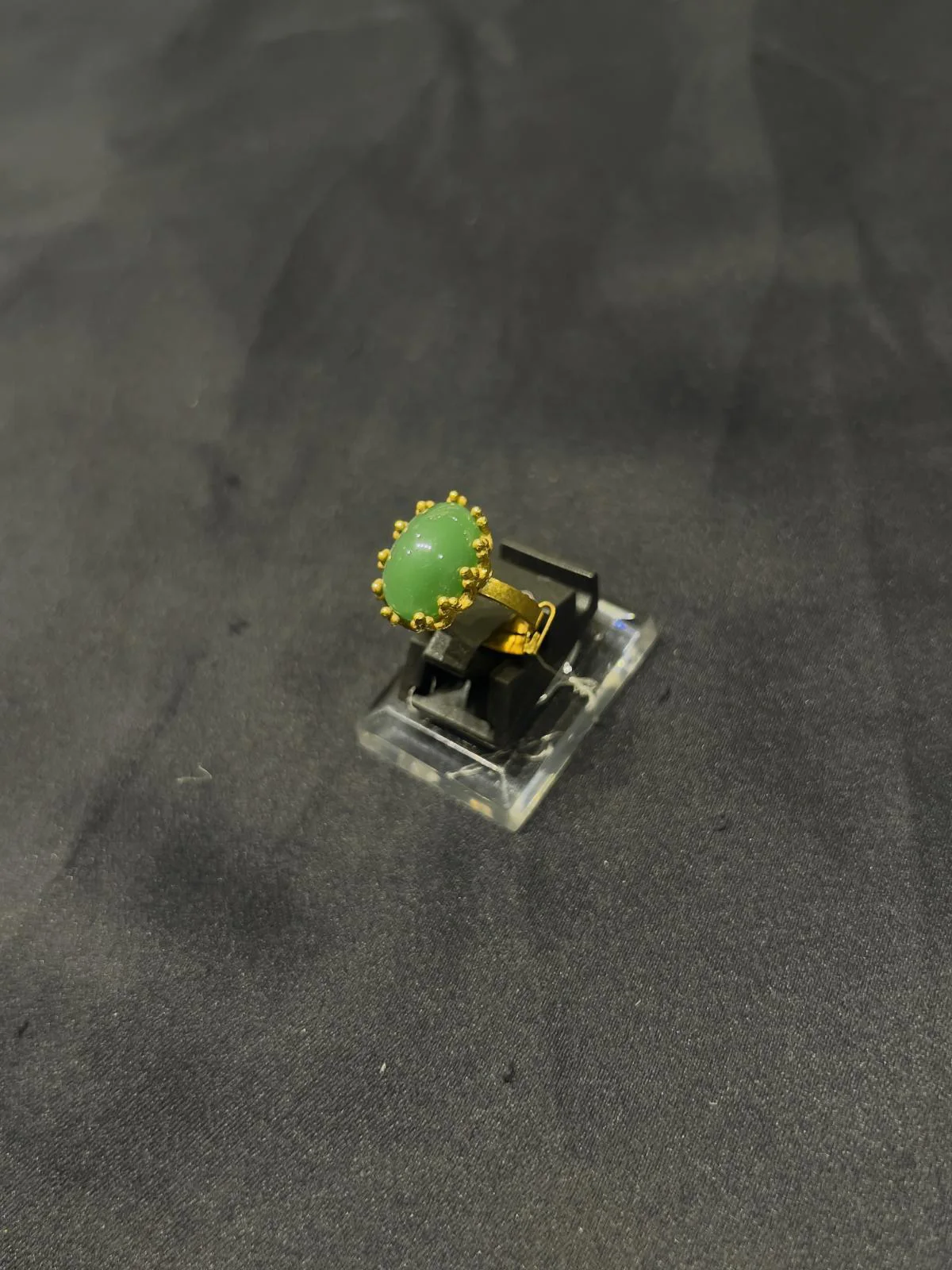 Goldplated adjustable Ring with green stone