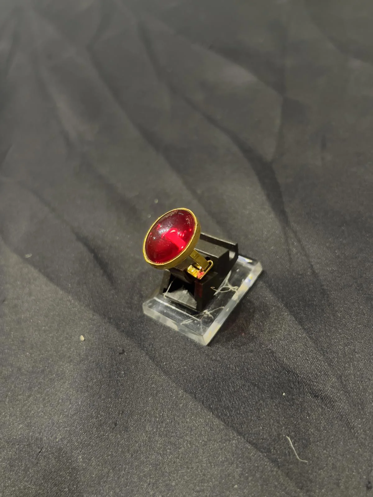 Goldplated adjustable Ring with red stone
