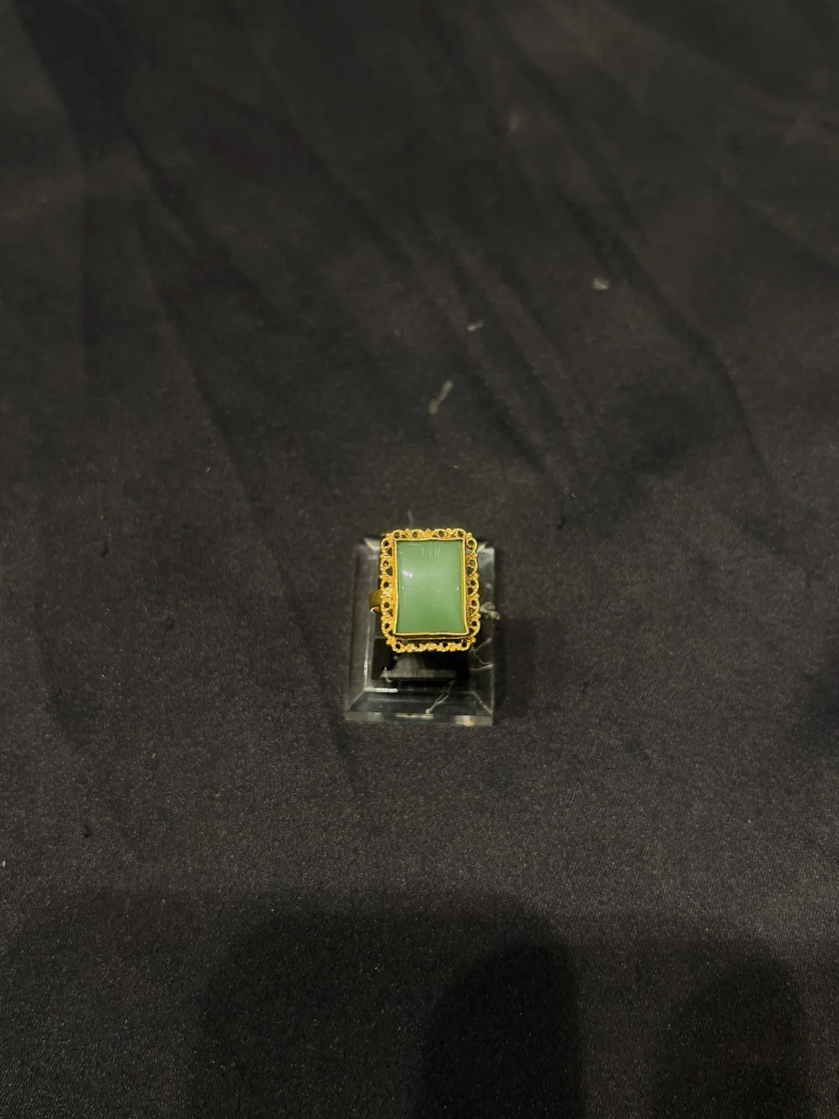 Goldplated adjustable Ring in green stone
