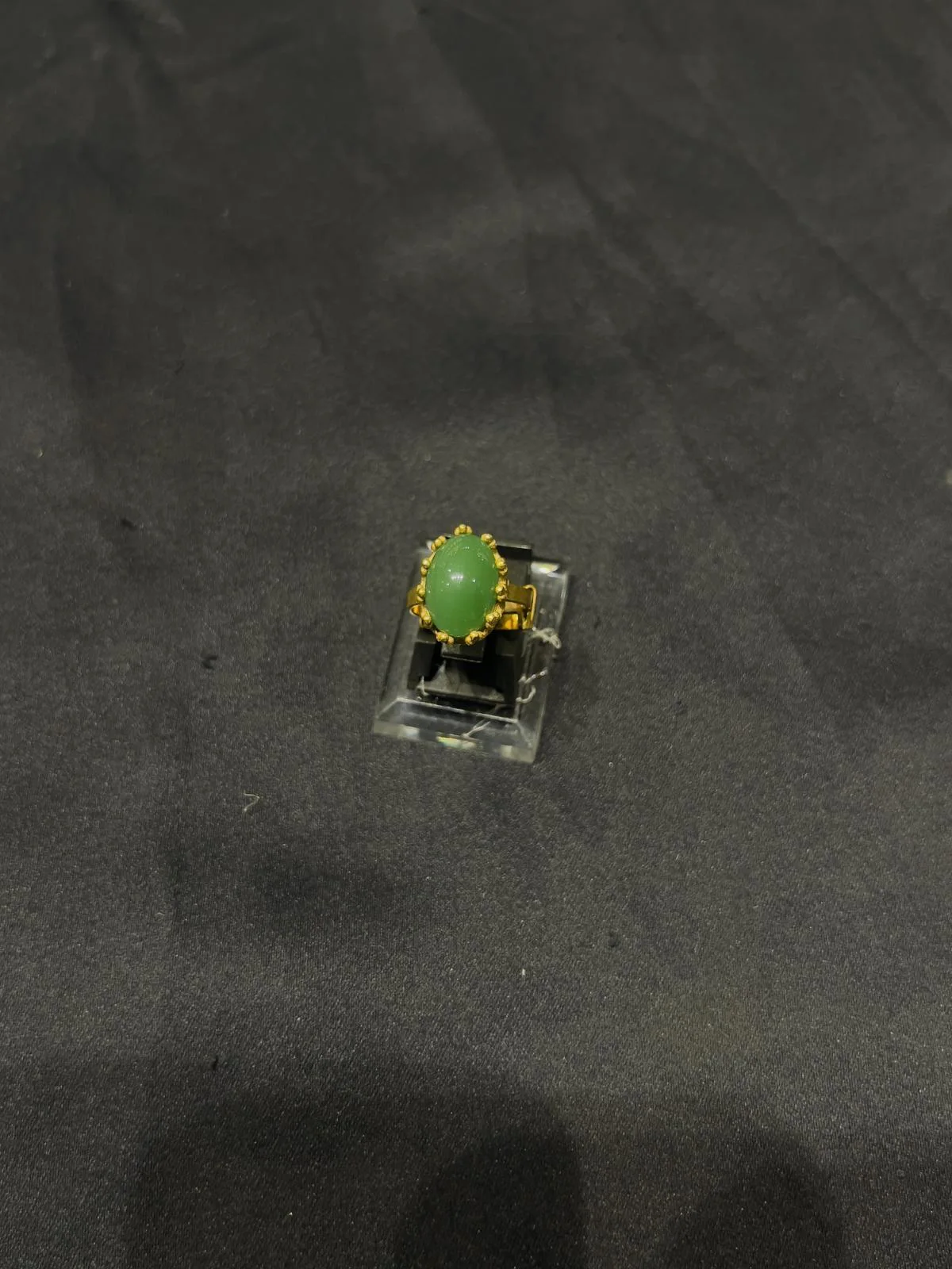 Goldplated adjustable Ring with green stone
