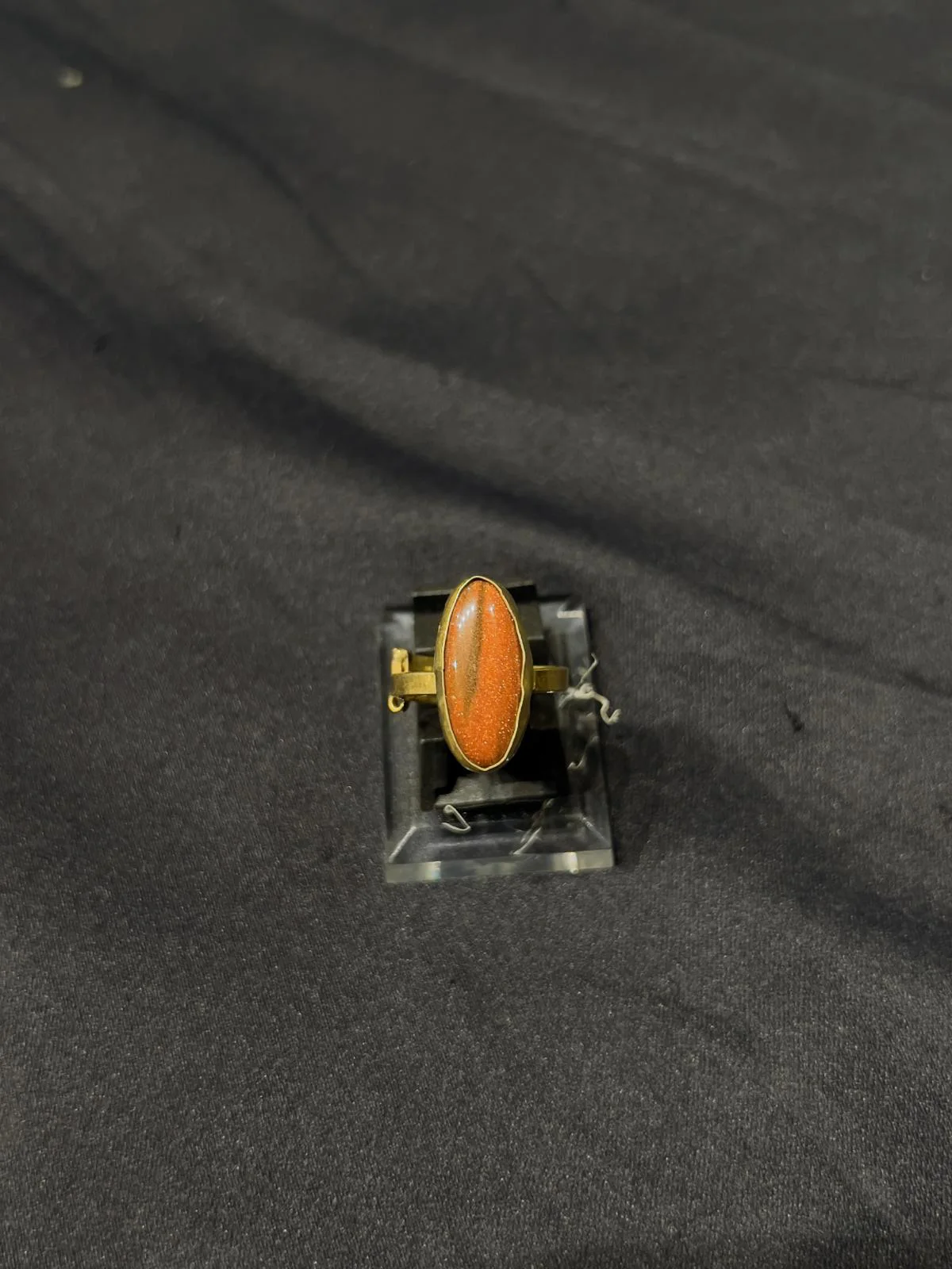 Goldplated adjustable Ring with brown stone
